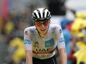 Cycling - Tour de France - Stage 8 - Oyonnax to Le Grand-Bornand - France - July 3, 2021 UAE Team Emirates rider Tadej Pogacar of Slovenia in action.