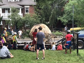 The massive "Bellwood Boulder," a glacial erratic weighing 16 tonnes unearthed during a water/sewer construction project in Old Ottawa South Capital Ward has found its new home in Windsor Park, just behind OC_Transpo bus stop.