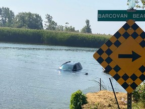 OPP charged a 53 year old Brighton man with impaired driving after a car ended up in a bay Monday.