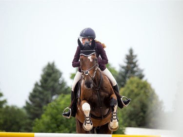 Wesley Clover Parks and the Ottawa Equestrian Tournaments host the Ottawa Summer Tournaments world class show jumping competition on Saturday, July 17, 2021. Eve Desrochers and Rock N'Roll took part in the events Saturday.