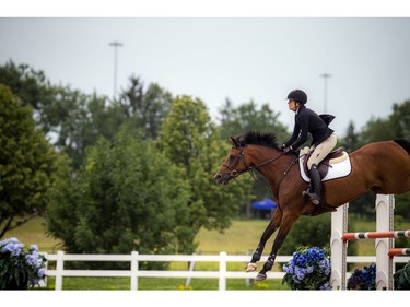 Wesley Clover Parks and the Ottawa Equestrian Tournaments host the Ottawa Summer Tournaments world class show jumping competition on Saturday, July 17, 2021. Catherine Otis, riding Jamaica, took part in the events Saturday.
