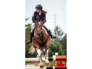 Wesley Clover Parks and the Ottawa Equestrian Tournaments host the Ottawa Summer Tournaments world class show jumping competition on Saturday, July 17, 2021. Eve Desrochers and Rock N'Roll took part in the events Saturday.