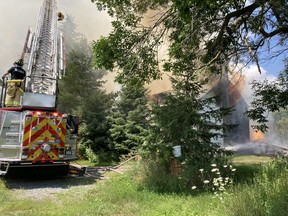 Firefighters battling a house fire on Malakoff Rd. in the North Gower region.