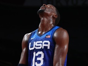 Edrice Adebayo of the United States looks dejected after losing to France in Olympic basketball.