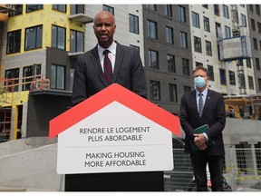 Ahmed Hussen, Minister of Families, Children and Social Development and the minister responsible for Canada Mortgage and Housing Corporation, speaks to the media Monday alongside David McGuinty, Member of Parliament for Ottawa South, to announce a $33.8 million low-coast loan to help construct a new residential building in Alta Vista in Ottawa.