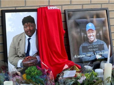 Family, friends and the community gathered on York Street to hold a vigil for Loris Tyson Ndongozi on Tuesday. Ndongozi, 20, was fatally shot Sunday night in Ottawa in what his family called the senseless killing of a gentle giant.