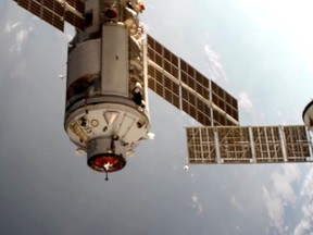 The Nauka (Science) Multipurpose Laboratory Module is seen during its docking to the International Space Station (ISS) on July 29, 2021 in this still image taken from video.