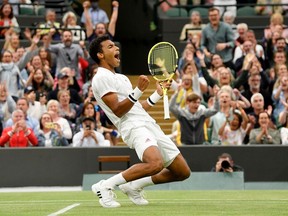 Tennis - Wimbledon - Canada's Felix Auger Aliassime celebrates winning his fourth round match against Germany's Alexander Zverev