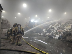 Ottawa Fire on scene of a garbage fire at a waste transfer station on Glenfield Drive off Stevenage Drive, August 29, 2021.