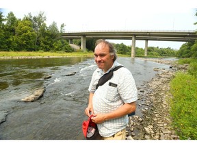 Writer Randy Boswell walks along the final 11-kilometre stretch of the Rideau River from Hog's Back Falls to Rideau Falls.
