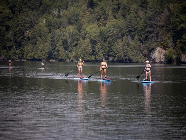 Paddleboarders enjoyed being out on Meech Lake on Saturday.