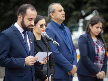 The Afghan-Canadian community held a small ceremony at The National War Memorial to honour veterans' sacrifices during the war in Afghanistan. Participants included, left to right, Saeid Toukhi, Diba Khawajazadah, Tawab Lodin and Shokoufa Toukhi.