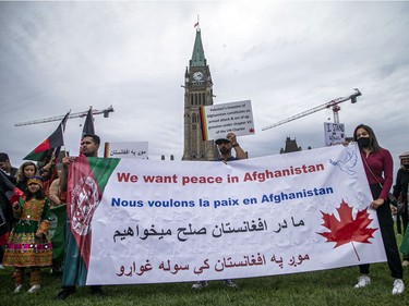 The Afghan-Canadian community held a small ceremony at The National War Memorial to pay respects to sacrifices made during the warn in Afghanistan. Later, a peaceful protest was held on Parliament Hill on Saturday afternoon.