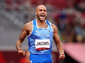 Lamont Marcell Jacobs of Team Italy reacts after winning the Men's 100m Final on day nine of the Tokyo 2020 Olympic Games at Olympic Stadium on August 01, 2021 in Tokyo, Japan. (Photo by David Ramos/Getty Images)