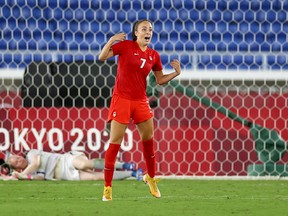 Julia Grosso celebrates after scoring to win the penalty shootout and the gold medal game. REUTERS/Edgar Su