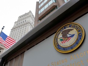 The seal of the United States Department of Justice is seen on the building exterior of the United States Attorney's Office of the Southern District of New York in Manhattan.