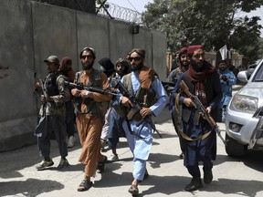 Taliban fighters patrol in Wazir Akbar Khan neighbourhood in the city of Kabul on Aug. 18. The world can't turn its back on Afghanistan.