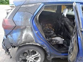 A photo released by the Vermont State Police on July 2, 2021 shows a 2019 Chevrolet Bolt EV after it caught fire on July 1, 2021 in Thetford, Vermont. - General Motors expanded a recall of its Chevrolet Bolt on Friday, announcing plans to repair thousands more of the electric autos in a move that will add $1 billion in costs.