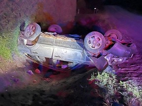 MRC des Collines police said the driver escaped serious injury after a car landed upside down in a ditch off River Road in Ange Gardien Tuesday night.