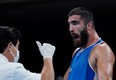 France's Mourad Aliev reacts after losing by disqualification against Britain's Frazer Clarke during their men's super heavy (over 91kg) quarter-final boxing match during the Tokyo 2020 Olympic Games.