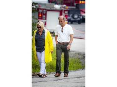 GATINEAU -- August 1, 2021 -- Emergency crews were on the scene of the fire at the main chalet at Mont Cascades Sunday, August 1, 2021. Richard (Rick) Hunter, president of Mont Cascades and his wife Catherine Hunter were on site Sunday morning to assess the damage of the fire.