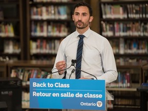 Ontario Education Minister Stephen Lecce speaks at a press conference for the Ontario Government at St. Robert Catholic High School in Toronto, on Wednesday, August 4, 2021.