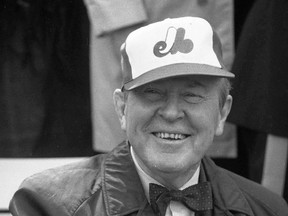 Former prime minister Lester B. Pearson is shown here at a Montreal Expos game. It seems voters were happy to give him minority governments — and he made the most of them.