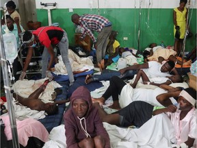 Injured people are treated at a hospital after Saturday's 7.2 magnitude quake in Les Cayes, Haiti August 17, 2021.