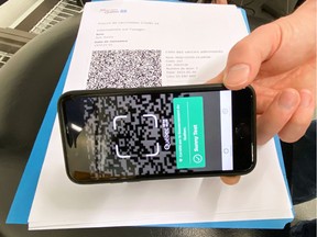 A test scan of a vaccine passport is shown at an Econofitness gym in Laval, Quebec, Canada August 17, 2021.