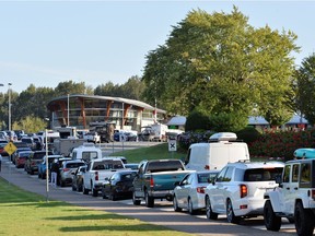 Travellers line up to enter Canada at the Peach Arch border crossing in B.C. as Canada eases restrictions for U.S. residents.