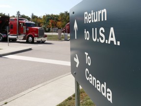 A truck leaves the Canada-United States border crossing at the Thousand Islands Bridge.