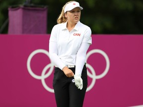 Brooke Henderson of Canada looks on during the opening round of Olympic golf.