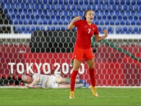 Julia Grosso of Canada celebrates after scoring the penalty to win the penalty shootout and the gold medal at the International Stadium Yokohama, Yokohama, Japan on August 6, 2021.