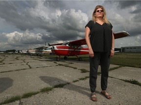 OTTAWA - Aug 18, 2021 -  Nicole Harris poses for a photo at the Rockcliffe Flying Club in Ottawa Wednesday.  Nicole is president of the Rockcliffe Flying Club which turns 60 in a week, but is at risk of bankruptcy.   TONY CALDWELL, Postmedia.
