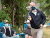 Conservative Leader Erin O'Toole plays a game of bean bag toss while campaigning at a drug rehab center Sunday, August 22, 2021 in New Westminster, B.C.