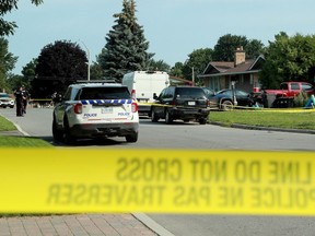 The Ottawa Police Service's homicide unit investigates on Sherry Lane on July 22, 2021, after Christopher Avery Houghton was stabbed to death.