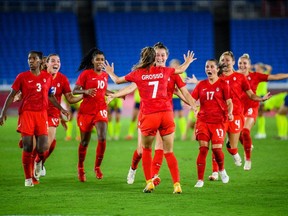 Julia Grosso of Canada celebrates with teammates after the women's football final during day 14 of the Tokyo 2020 Olympic Games on August 6, 2021 in Tokyo.