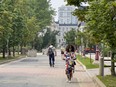 Visitors stroll through the University of Ottawa campus.