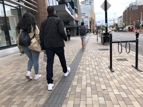 The pedestrian view near Lansdowne Park. Matthew Pinder walked the nine-km length of Bank Street to get a new perspective on how we plan our streets and our city.