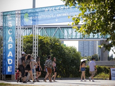 Young festival goers make their way to the entrance for Escapade Music Festival that was held at the RCGT Park, Saturday, Sept. 4, 2021.