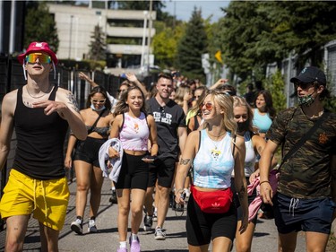 Young festival goers make their way to the entrance for Escapade Music Festival that was held at the RCGT Park, Saturday, Sept. 4, 2021.