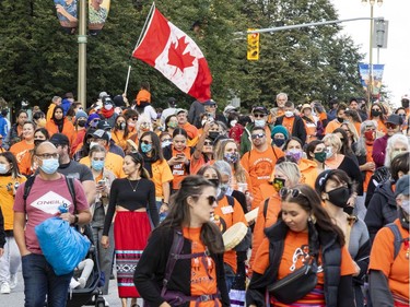 Participants in a Spirit Walk, part of Remember Me : A National Day of Remembrance, on the inaugural National Day for Truth and Reconciliation on Thursday.