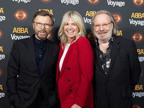 Zoe Ball poses with Björn Ulvaeus (L) and Benny Andersson of ABBA during the London launch of ABBA 'Voyage' on Thursday in London, United Kingdom. During the launch, they also announced a brand new studio album, 'Voyage', which will be released on Nov. 5, 2021.