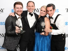 Left to right: Charlie Rosen, Matt Stine, Katie Kresek, and Justin Levine, winners of the award for Best Orchestrations for "Moulin Rouge! The Musical," pose in the press room during the 74th Annual Tony Awards at Winter Garden Theatre on September 26, 2021 in New York City.