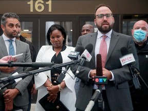 Aissatou Diallo - the driver in the Westboro bus crash - was found not guilty on all counts Wednesday. She emerged from the courthouse with her two lawyers, Solomon Friedman, right, and Fady Mansour.