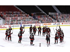 The Ottawa Senators acknowledge the fans at the empty Canadian Tire Centre following their last game of the season where they defeated the Toronto Maple Leafs in overtime. ERROL MCGIHON/Postmedia