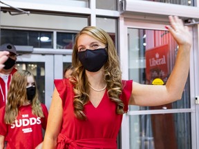 Jenna Sudds celebrates as she arrives at her Liberal campaign headquarters in the Kanata-Carleton riding.