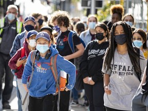 People wearing masks in Ottawa.