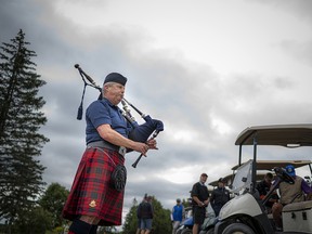 Brad Hampson, a director with the Ottawa Police Veterans Association, leads golfers onto Pineview Golf Course with his bagpipes. The OPVA held their annual golf tournament last Thursday, raising funds and awareness for the OPVA Benevolent Fund and Badge of Courage, a local Alcoholics Anonymous group.