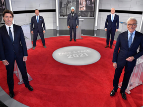 The official group photo of Thursday night's leaders debate. It's not entirely clear why It's not entirely clear why both Justin Trudeau and Yves-François Blanchet appear to have chosen a martial arts stance.